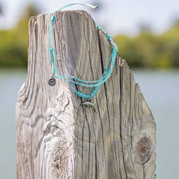 Dolphin Charm Bracelet on Species Mantra Wood Ornament